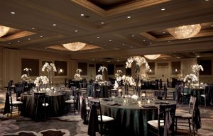 Dramatic social event with large centerpieces